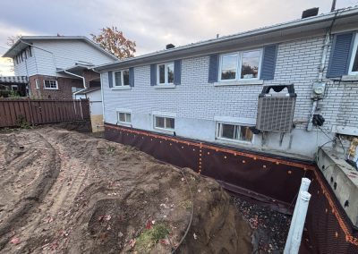 Installation de drain français autour de la fondation dans la région de Berthierville - Mini Excavation Joliette
